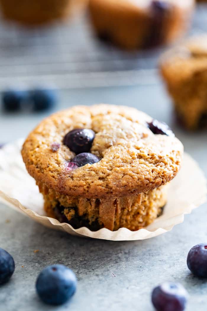 These keto blueberry muffins have a crisp top and a soft, fluffy inside!  They have a sweet nutty flavor thanks to almond butter and almond flour, and are loaded with plenty of juicy sweet blueberries.  They’re paleo, gluten-free, dairy-free, and low carb.