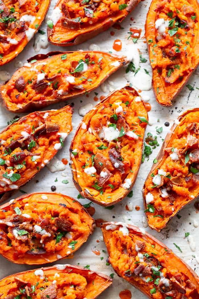 We’re taking sweet potatoes to a new level today with these spicy loaded buffalo sweet potato skins!  The skins are baked until crisp and then loaded with the most delicious filling.  One bite and you’ll be addicted!  Perfect appetizer or fun side dish that just happens to be Whole30 compliant.