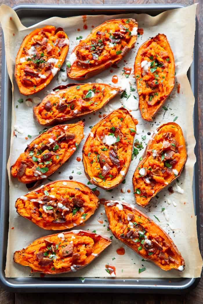 We’re taking sweet potatoes to a new level today with these spicy loaded buffalo sweet potato skins!  The skins are baked until crisp and then loaded with the most delicious filling.  One bite and you’ll be addicted!  Perfect appetizer or fun side dish that just happens to be Whole30 compliant.