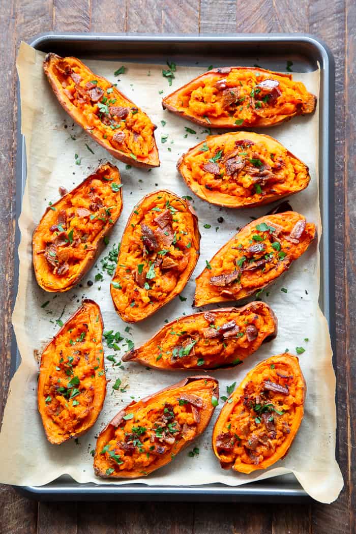 We’re taking sweet potatoes to a new level today with these spicy loaded buffalo sweet potato skins!  The skins are baked until crisp and then loaded with the most delicious filling.  One bite and you’ll be addicted!  Perfect appetizer or fun side dish that just happens to be Whole30 compliant.