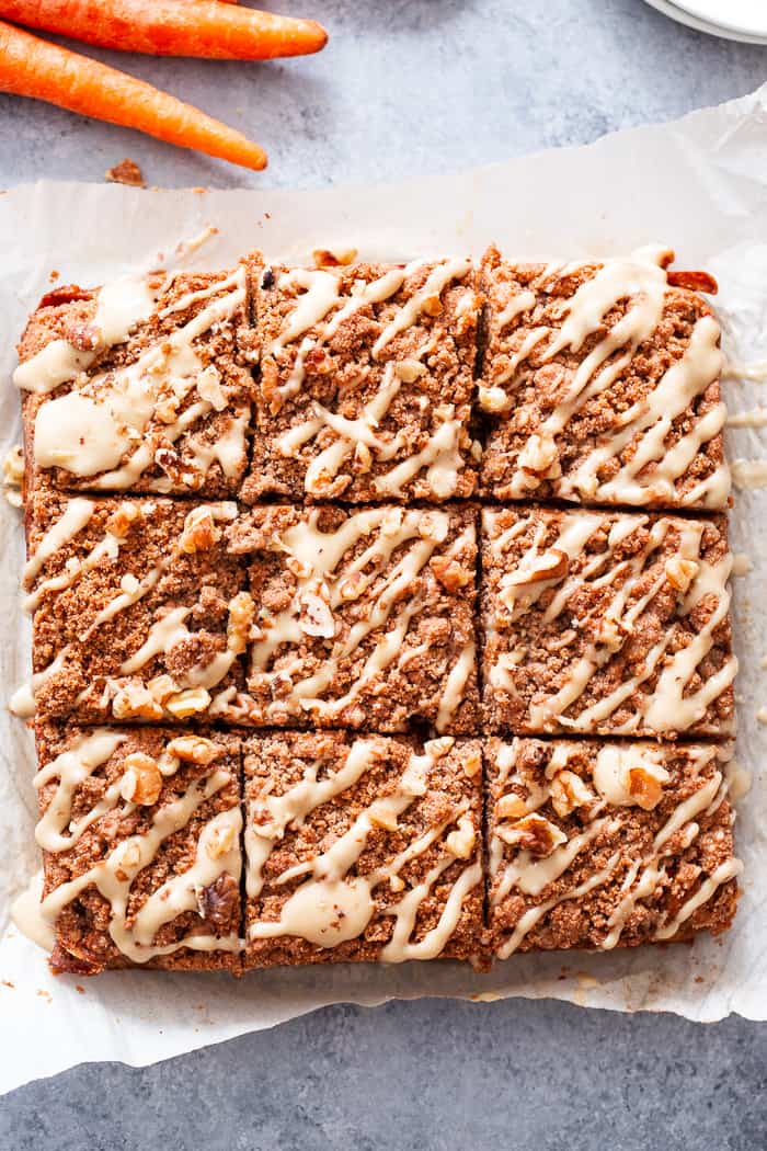 Sweet and moist, with lots of cinnamon crumb topping, this carrot cake coffee cake is sure to become a favorite!  It’s perfect for serving to guests or making ahead of time as a grab and go breakfast.  It's gluten-free, dairy-free, paleo, and family approved!