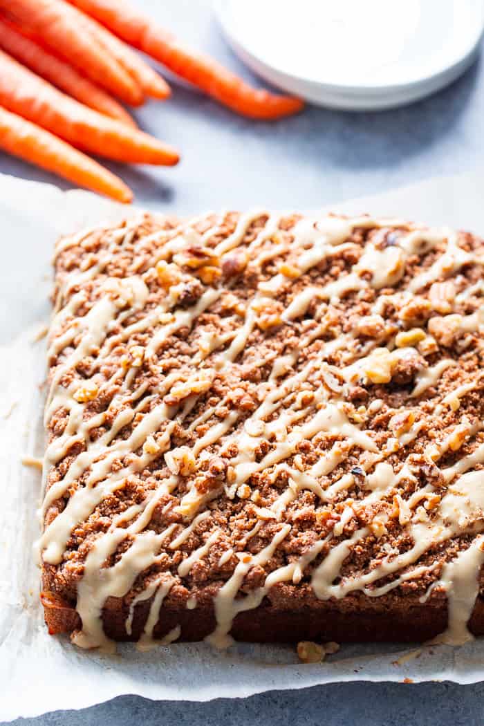 Sweet and moist, with lots of cinnamon crumb topping, this carrot cake coffee cake is sure to become a favorite!  It’s perfect for serving to guests or making ahead of time as a grab and go breakfast.  It's gluten-free, dairy-free, paleo, and family approved!