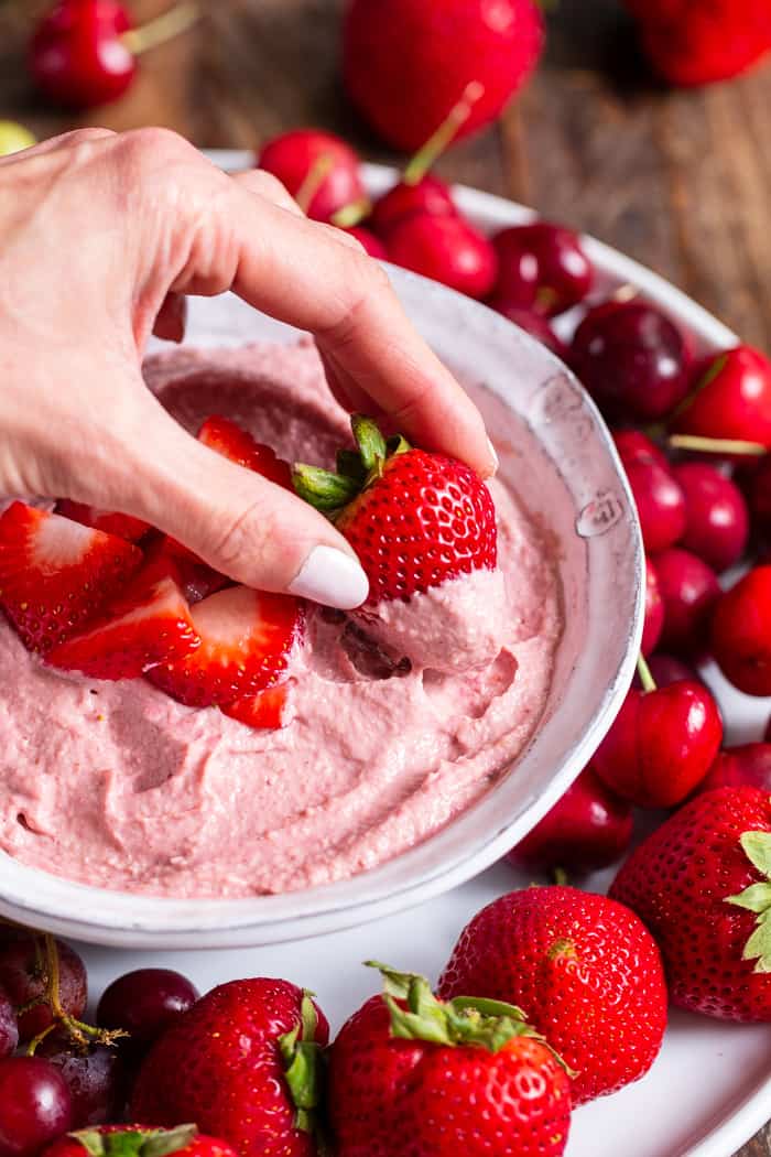 This creamy strawberry cheesecake dip is perfect for dipping fruit or as a spread on quick breads and muffins.  A strawberry puree  is swirled into a cashew based “cheesecake” dip making a fruity, sweet, tangy dip that’s great to serve to a crowd.