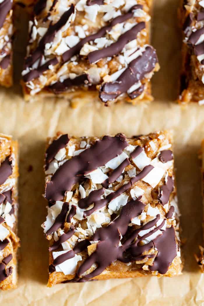 These dreamy cookie bars are a healthier spin on my favorite Girl Scout cookies from childhood. An easy shortbread crust topped with a caramel coconut layer, and drizzled all over with melted dark chocolate. These chewy sweet bars are gluten free, dairy free, paleo, and vegan.