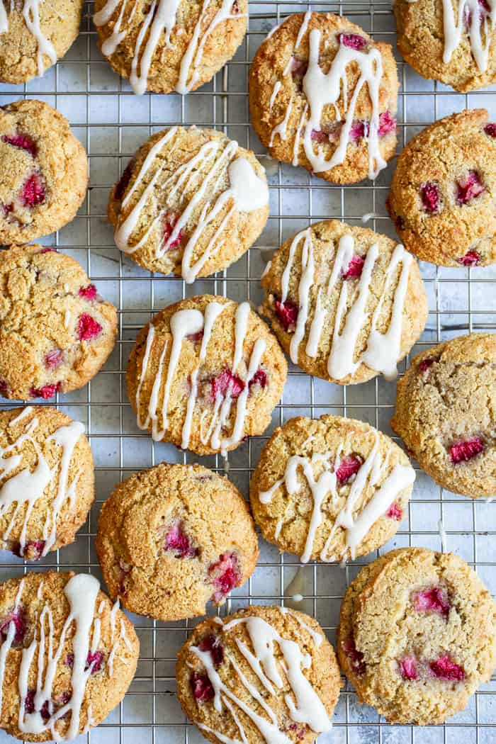 These strawberry shortcake cookies are super soft and cake-like with buttery flavor, loads of sweet juicy strawberries and maple glaze.  They’re paleo, grain free, gluten-free, kid approved, and irresistibly delicious!