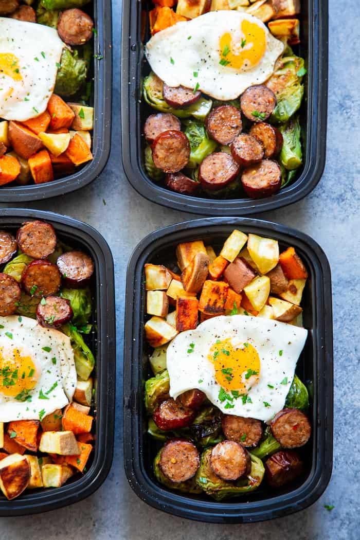 Get breakfast ready the night before with these easy sweet potato, sausage, veggie, and egg Paleo breakfast meal prep bowls!  They’re simple, Whole30 complaint, dairy free, junk free, tasty and filling!