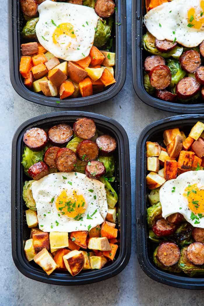 Get breakfast ready the night before with these easy sweet potato, sausage, veggie, and egg Paleo breakfast meal prep bowls!  They’re simple, Whole30 complaint, dairy free, junk free, tasty and filling!