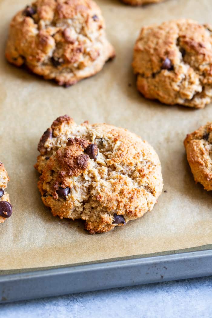 These easy chunky monkey scones are so ridiculously delicious that you won’t believe they’re grain free, dairy free and paleo!  The winning combination of bananas, nut butter, chopped nuts and chocolate is somehow even better in scone form!  Great for brunches, snacks and even dessert, the soft inside and crisp outside will quickly get you addicted!