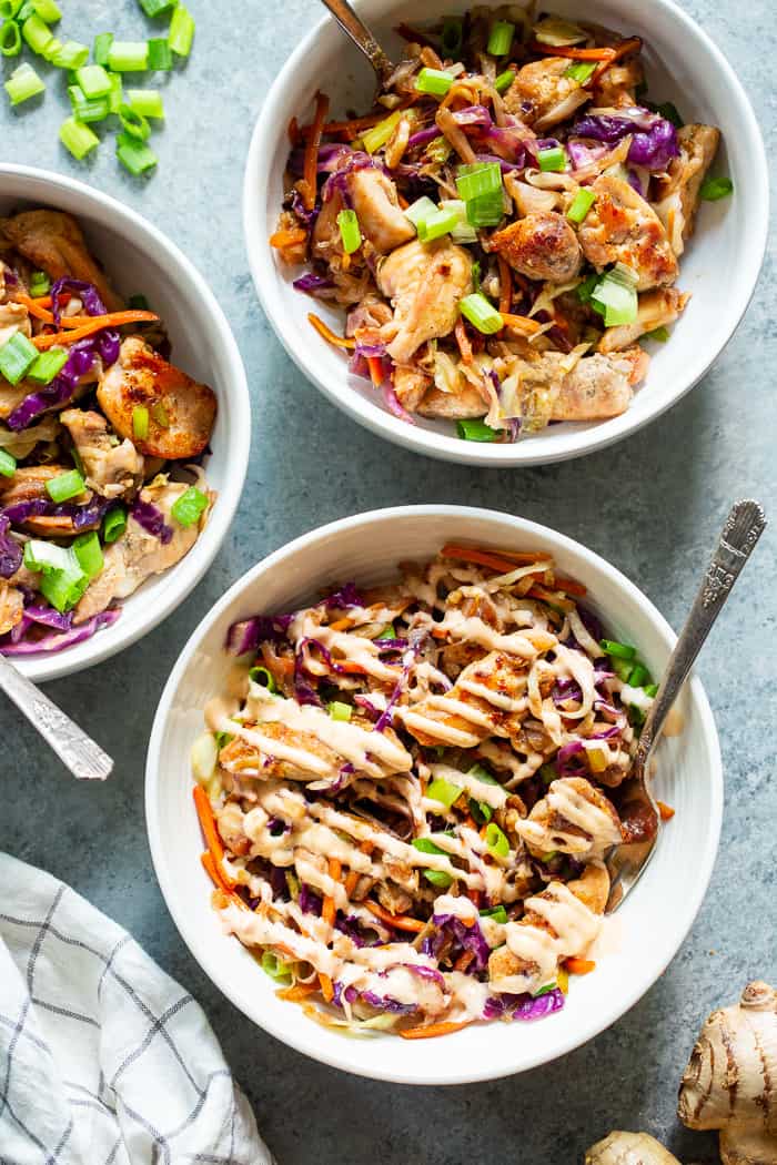 Simple yet incredibly delicious, these Paleo Egg Roll Bowls with Chicken are bound to become a new go-to for you!  An easy stir fry that tastes just like an egg roll topped with a sesame aioli that you’ll want to put on everything!  Whole30 and keto friendly too.