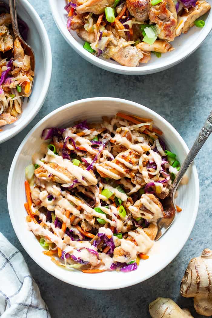 Simple yet incredibly delicious, these Paleo Egg Roll Bowls with Chicken are bound to become a new go-to for you!  An easy stir fry that tastes just like an egg roll topped with a sesame aioli that you’ll want to put on everything!  Whole30 and keto friendly too.