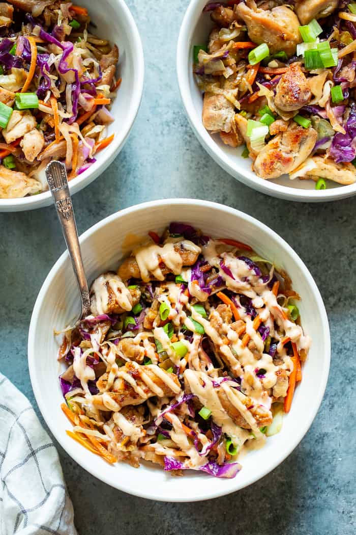 Simple yet incredibly delicious, these Paleo Egg Roll Bowls with Chicken are bound to become a new go-to for you!  An easy stir fry that tastes just like an egg roll topped with a sesame aioli that you’ll want to put on everything!  Whole30 and keto friendly too.