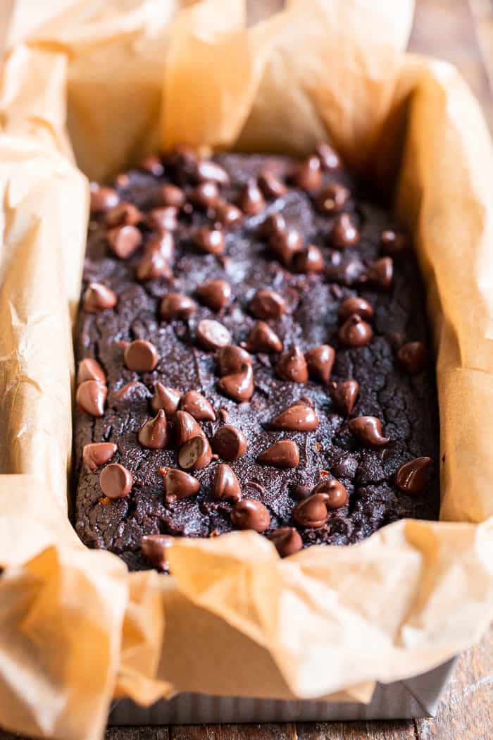 This double chocolate chip paleo pumpkin bread is moist, cake-like, and packs a big flavor punch with lots of dark chocolate flavor AND warm pumpkin pie spices. It’s gluten free, grain free, dairy free, and nut free. 