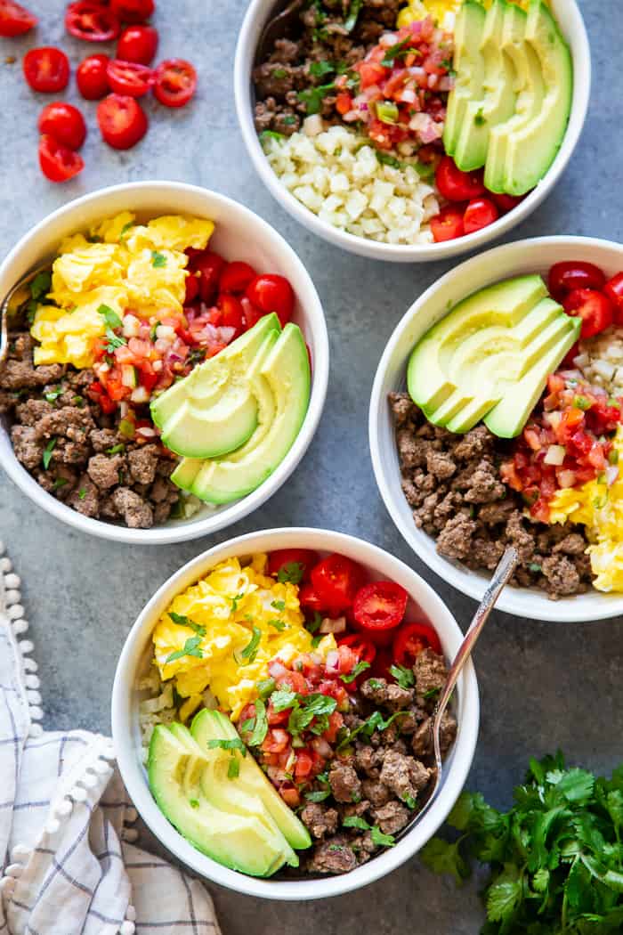 These loaded breakfast taco bowls are a fun breakfast idea and great for dinner too!  They’re easy to prep ahead of time, just make sure you leave out the avocado until you’re ready to serve.  Gluten-free, Paleo, Whole30 compliant, and keto diet friendly. 