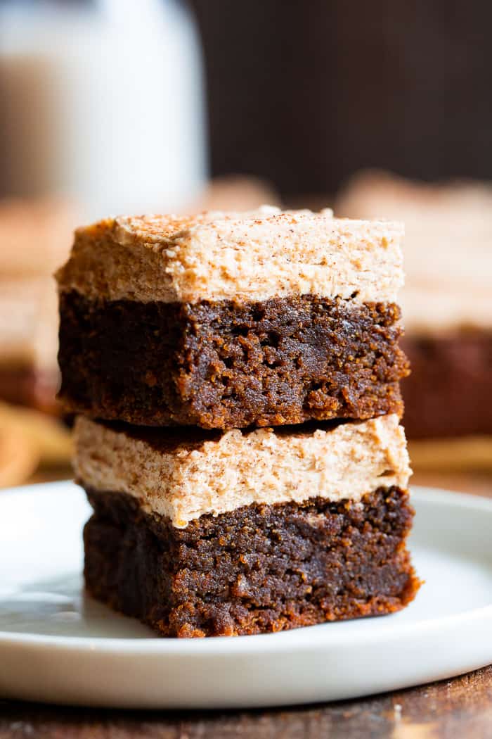 These Paleo Pumpkin Spice Latte Blondies are a fun spin on your favorite hot fall beverage!  Soft fudgy pumpkin blondies flavored with lots of pumpkin pie spices and espresso are topped with a creamy frosting for the ultimate fall themed paleo blondies! 