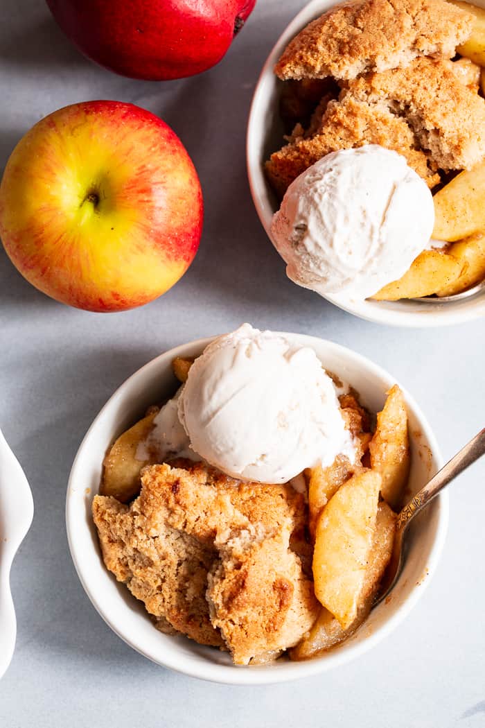 This paleo and vegan pear apple cobbler is a dreamy fall dessert made healthier with no refined sugar, grains, or dairy.  A gooey apple pear filling is topped with sweet crisp cobbler and baked to golden brown perfection!  Serve with your favorite dairy free ice cream for the ultimate treat!