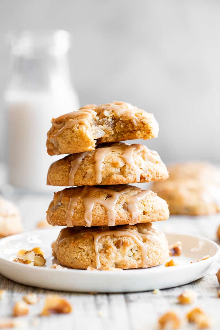 These soft dreamy sugar cookies are packed with both maple sugar and maple syrup, vanilla and crunchy toasty walnuts.  An easy maple glaze makes them over the top delicious! They’re also totally paleo, gluten free and grain free with a dairy free option.