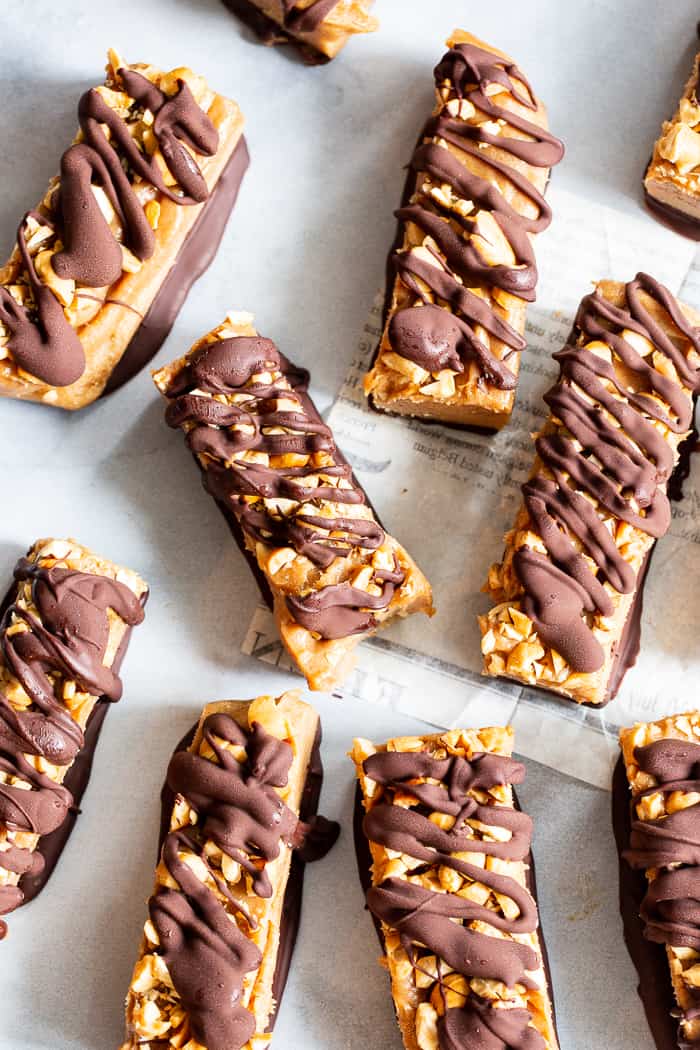 These gooey sweet healthy candy bars are packed with good for you ingredients like fruit and nuts, but taste 100% like a legit rich chewy candy bar!  These paleo and vegan candy bars are gluten free, egg free, dairy-free and free of refined sugar.  