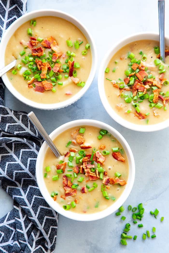 This easy and delicious creamy potato soup is loaded with flavor, bacon, and hearty chunks of potatoes too.  It’s the perfect comfort food on cold winter nights!  It’s dairy-free, Whole30 compliant and paleo friendly.