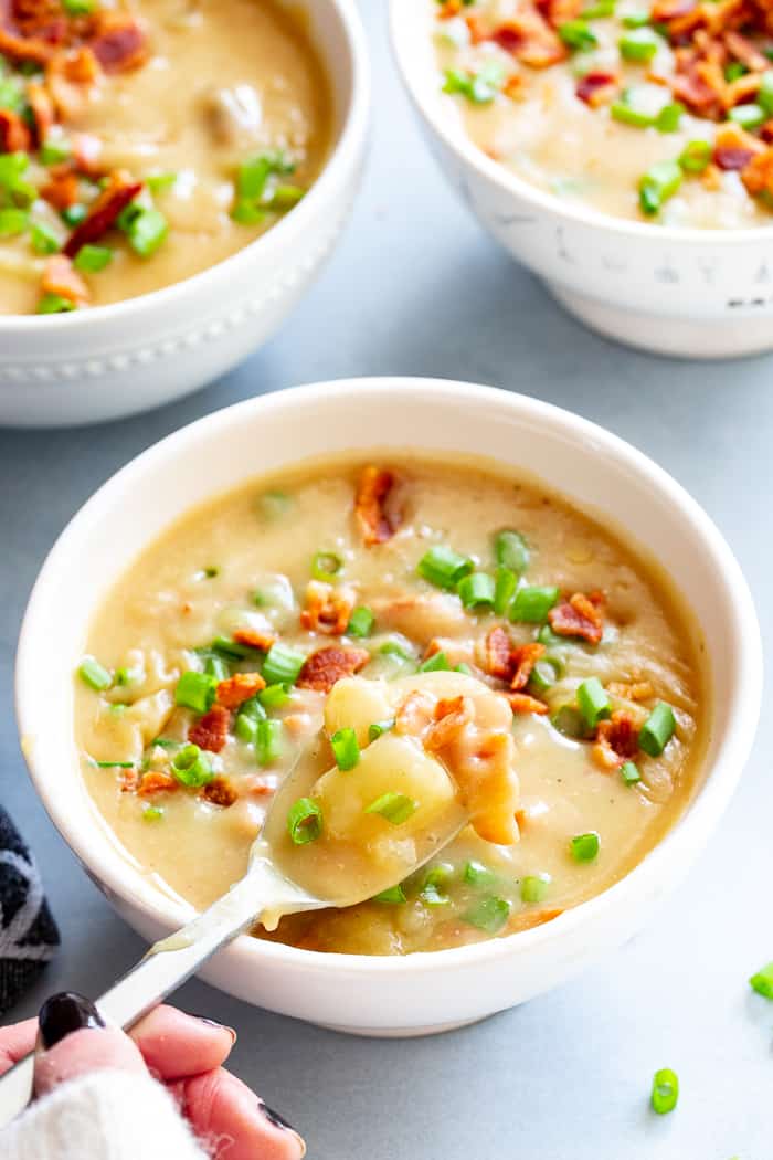 This easy and delicious creamy potato soup is loaded with flavor, bacon, and hearty chunks of potatoes too.  It’s the perfect comfort food on cold winter nights!  It’s dairy-free, Whole30 compliant and paleo friendly.