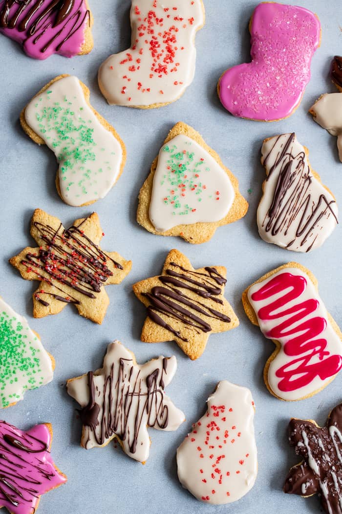 The best Paleo Sugar Cookies I've tried are finally here!   A sneak-peak from my book Paleo Baking at Home*, these cutout sugar cookies are crisp and slightly chewy with a buttery flavor and paleo friendly icing.  