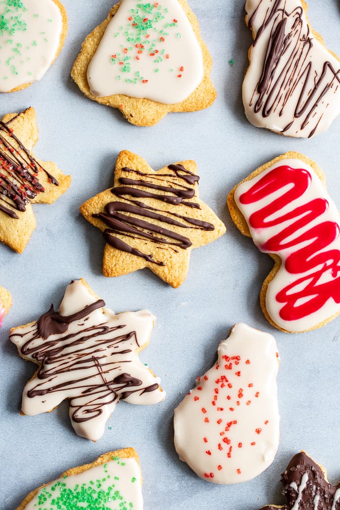 The best Paleo Sugar Cookies I've tried are finally here!   A sneak-peak from my book Paleo Baking at Home*, these cutout sugar cookies are crisp and slightly chewy with a buttery flavor and paleo friendly icing.  