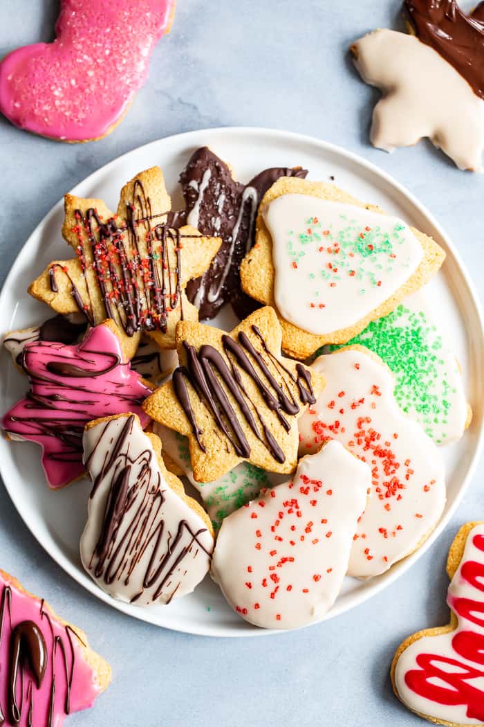 The best Paleo Sugar Cookies I've tried are finally here!   A sneak-peak from my book Paleo Baking at Home*, these cutout sugar cookies are crisp and slightly chewy with a buttery flavor and paleo friendly icing.  
