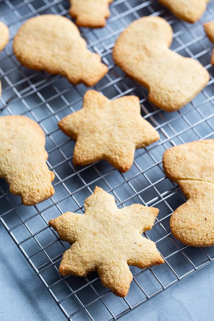 The best Paleo Sugar Cookies I've tried are finally here!   A sneak-peak from my book Paleo Baking at Home*, these cutout sugar cookies are crisp and slightly chewy with a buttery flavor and paleo friendly icing.  