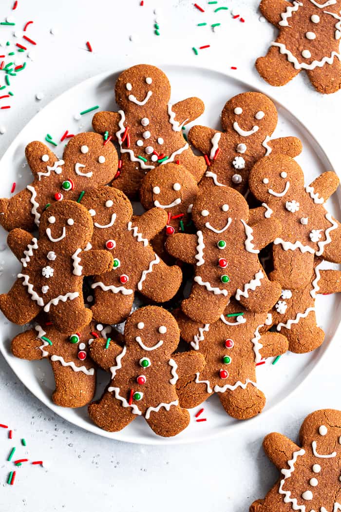 These paleo gingerbread cookies are chewy and crisp with traditional flavor from molasses and spices. The dough is easy to work with and cut making them perfect for holiday baking and decorating! They’re gluten-free and grain-free. #AD #KingArthurFlour
