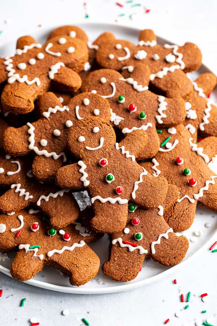 These paleo gingerbread cookies are chewy and crisp with traditional flavor from molasses and spices. The dough is easy to work with and cut making them perfect for holiday baking and decorating! They’re gluten-free and grain-free. #AD #KingArthurFlour