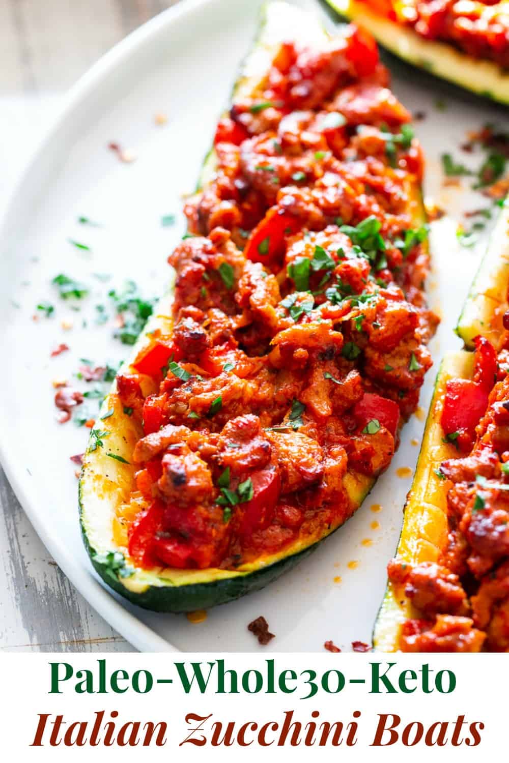 These hearty Italian Zucchini Boats are flavor packed and make a quick, healthy and fun dinner!   They're also perfect to meal prep ahead of time for busy nights and are totally dairy-free, grain free, keto, paleo and Whole30 compliant, and Low FODMAP. #cleaneating #lowFODMAP #keto #paleo