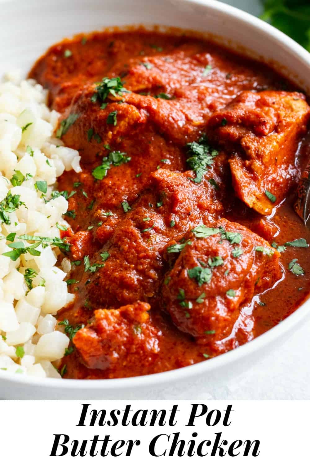 This Instant Pot Indian Butter Chicken is super easy to make and so flavorful!  With just the right amount of spice and a thick creamy tomato sauce, It’s perfect over cauliflower rice to keep it Paleo, Whole30, and keto friendly. #cleaneating #whole30 #paleo #keto