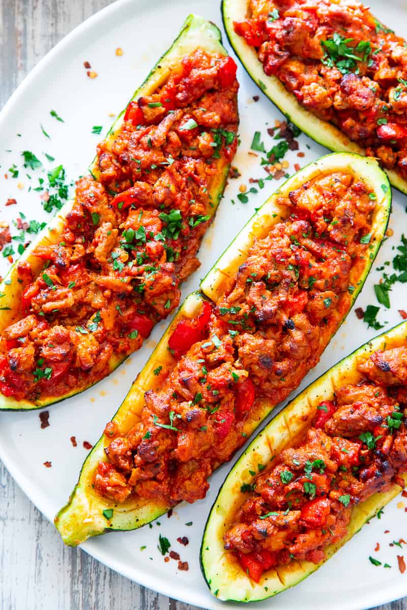  These hearty Italian Zucchini Boats are flavor packed and make a quick, healthy and fun dinner!   They're also perfect to meal prep ahead of time for busy nights and are totally dairy-free, grain free, keto, paleo and Whole30 compliant, and Low FODMAP. #cleaneating #lowFODMAP #keto #paleo