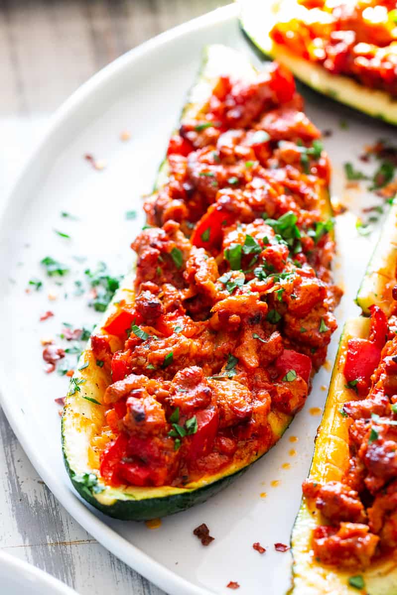These hearty Italian Zucchini Boats are flavor packed and make a quick, healthy and fun dinner!   They're also perfect to meal prep ahead of time for busy nights and are totally dairy-free, grain free, keto, paleo and Whole30 compliant, and Low FODMAP. #cleaneating #lowFODMAP #keto #paleo