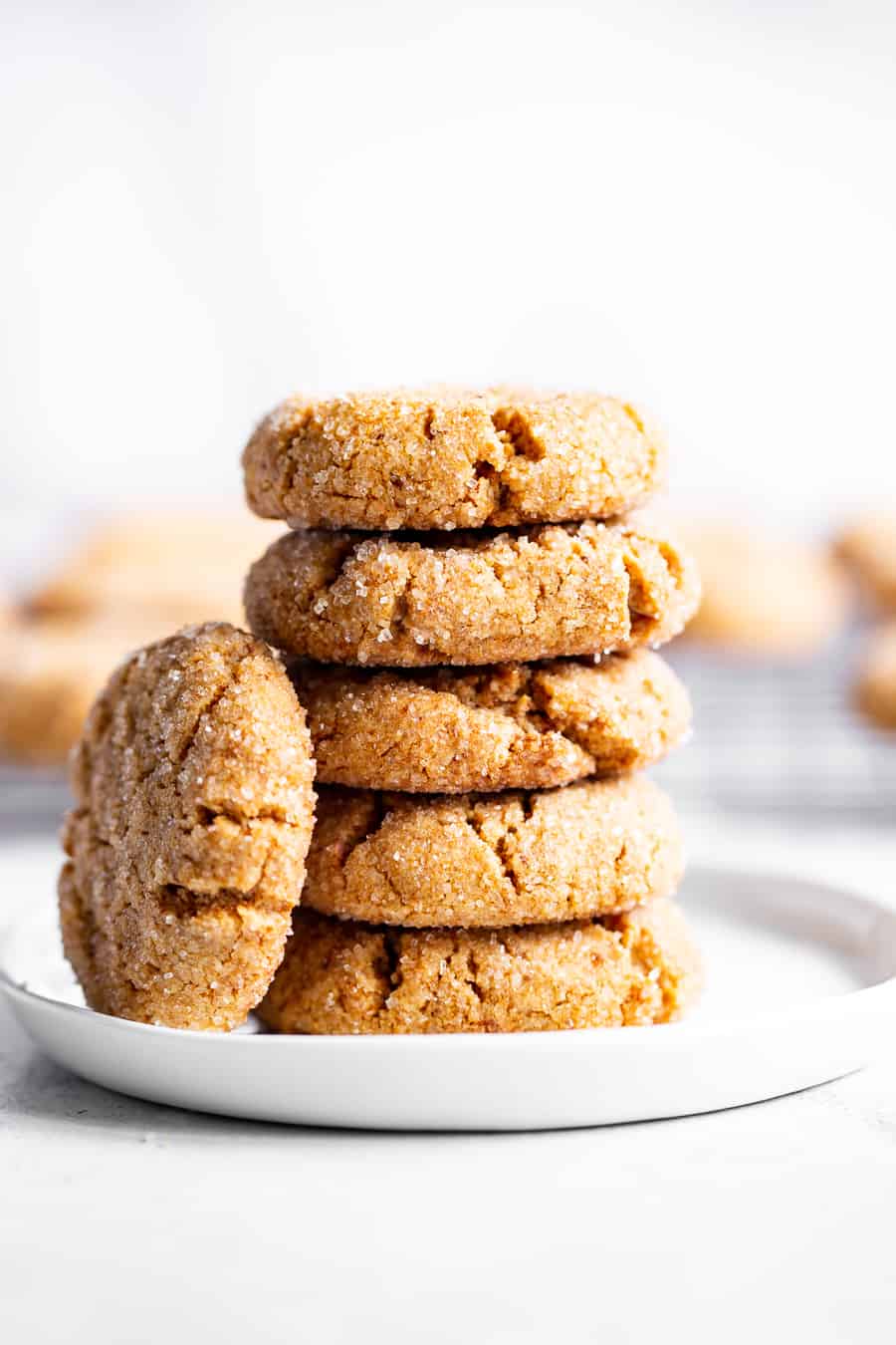 These one bowl peanut butter cookies are make with your favorite creamy nut butter and just a few simple, healthy ingredients!  They’re soft and a little crisp, egg free, vegan, and perfect for simple desserts and snacks, and to make with kids!  Use almond or cashew butter to keep them paleo or peanut butter if you prefer! #paleo #vegan #glutenfree