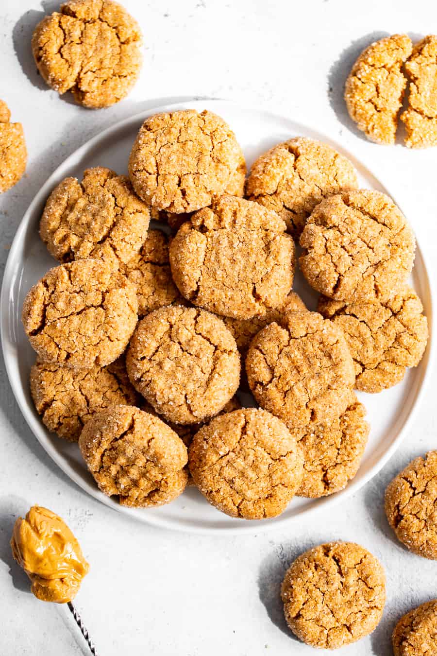 These one bowl peanut butter cookies are make with your favorite creamy nut butter and just a few simple, healthy ingredients!  They’re soft and a little crisp, egg free, vegan, and perfect for simple desserts and snacks, and to make with kids!  Use almond or cashew butter to keep them paleo or peanut butter if you prefer! #paleo #vegan #glutenfree