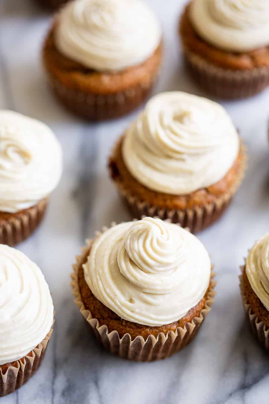 These tender and moist banana cupcakes are topped with the perfect cashew cream cheese frosting that you won’t believe is dairy-free! These crowd pleasing paleo cupcakes are perfect for kids, gluten free and dairy free. #paleo #glutenfree #cleaneating #dairyfree #paleobaking #paleocake