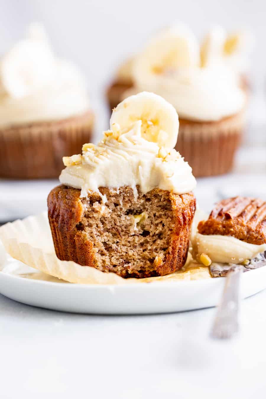 These tender and moist banana cupcakes are topped with the perfect cashew cream cheese frosting that you won’t believe is dairy-free! These crowd pleasing paleo cupcakes are perfect for kids, gluten free and dairy free. #paleo #glutenfree #cleaneating #dairyfree #paleobaking #paleocake