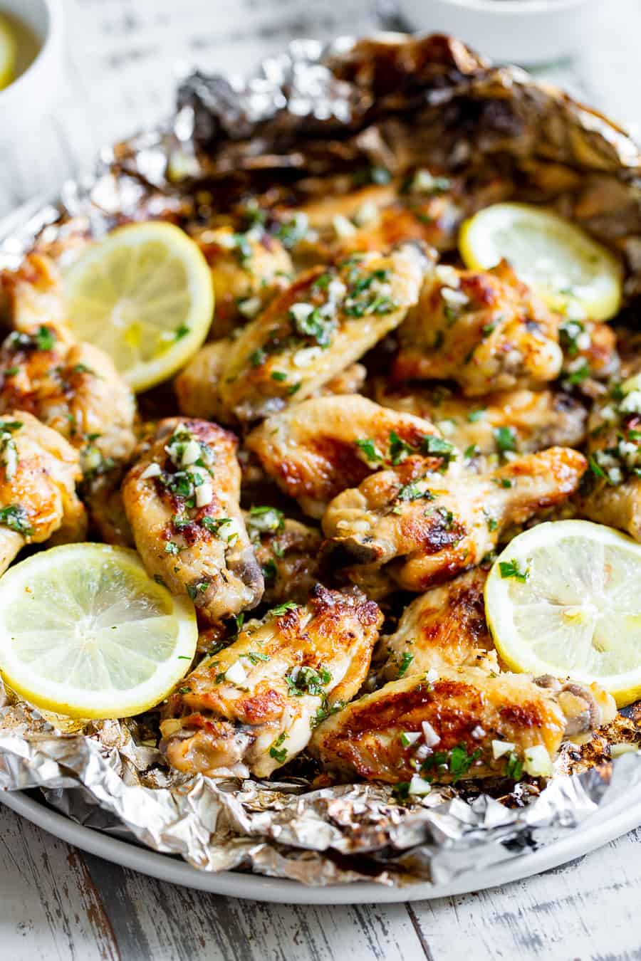 https://www.paleorunningmomma.com/wp-content/uploads/2020/07/lemon-garlic-wings_-6.jpg