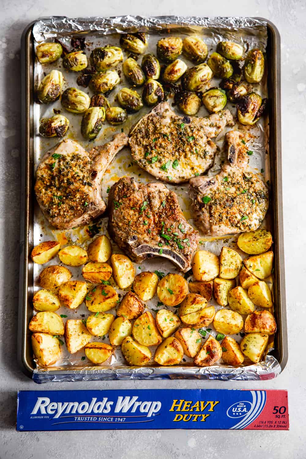 Sheet Pan Ranch Pork Chops with Potatoes and Brussels Sprouts