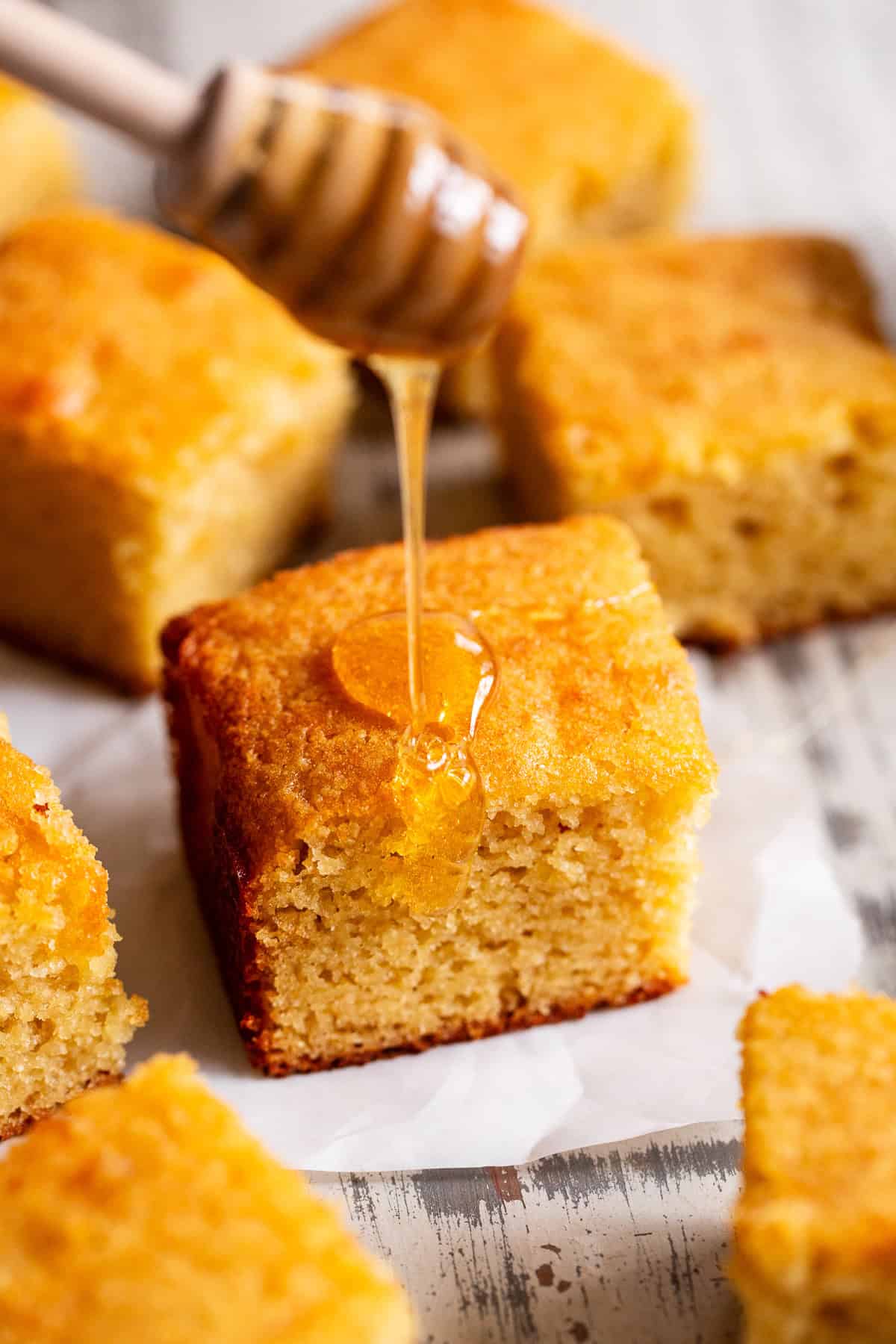 paleo cornbread with a drizzle of honey