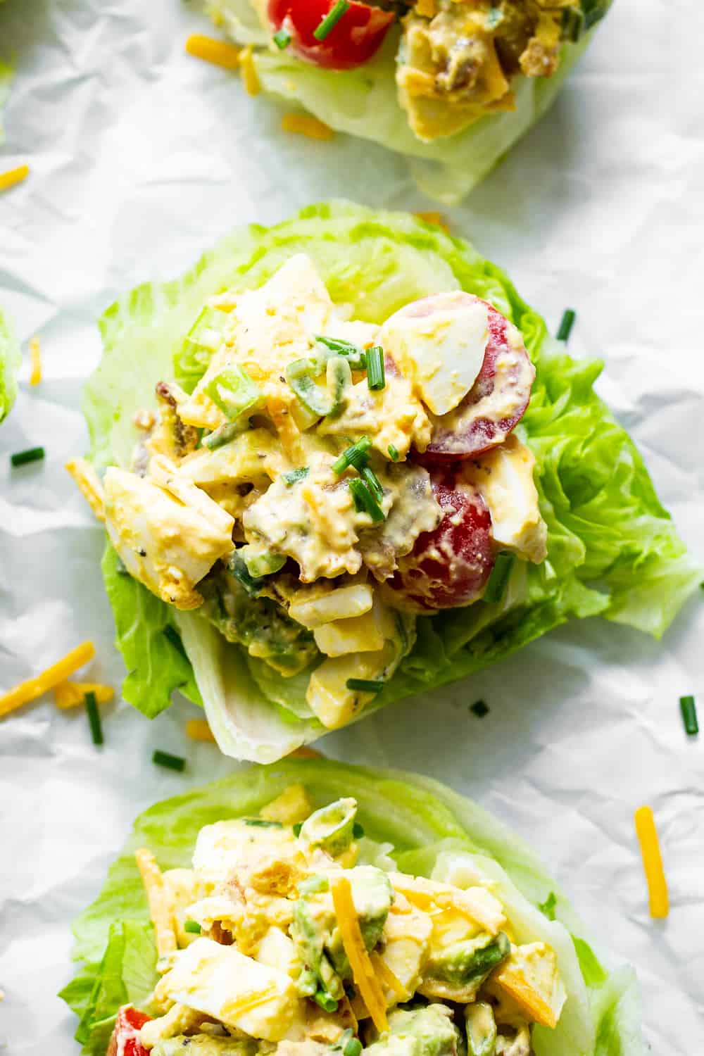 This cobb egg salad has all the goodies you’ll find in your favorite cobb salad!  Perfect for summer lunches and picnics, serve it over a simple green salad or in lettuce wraps for a protein packed meal with tons of flavor!  Paleo, Whole30, low carb and keto friendly. #paleo #keto #whole30 #cleaneating