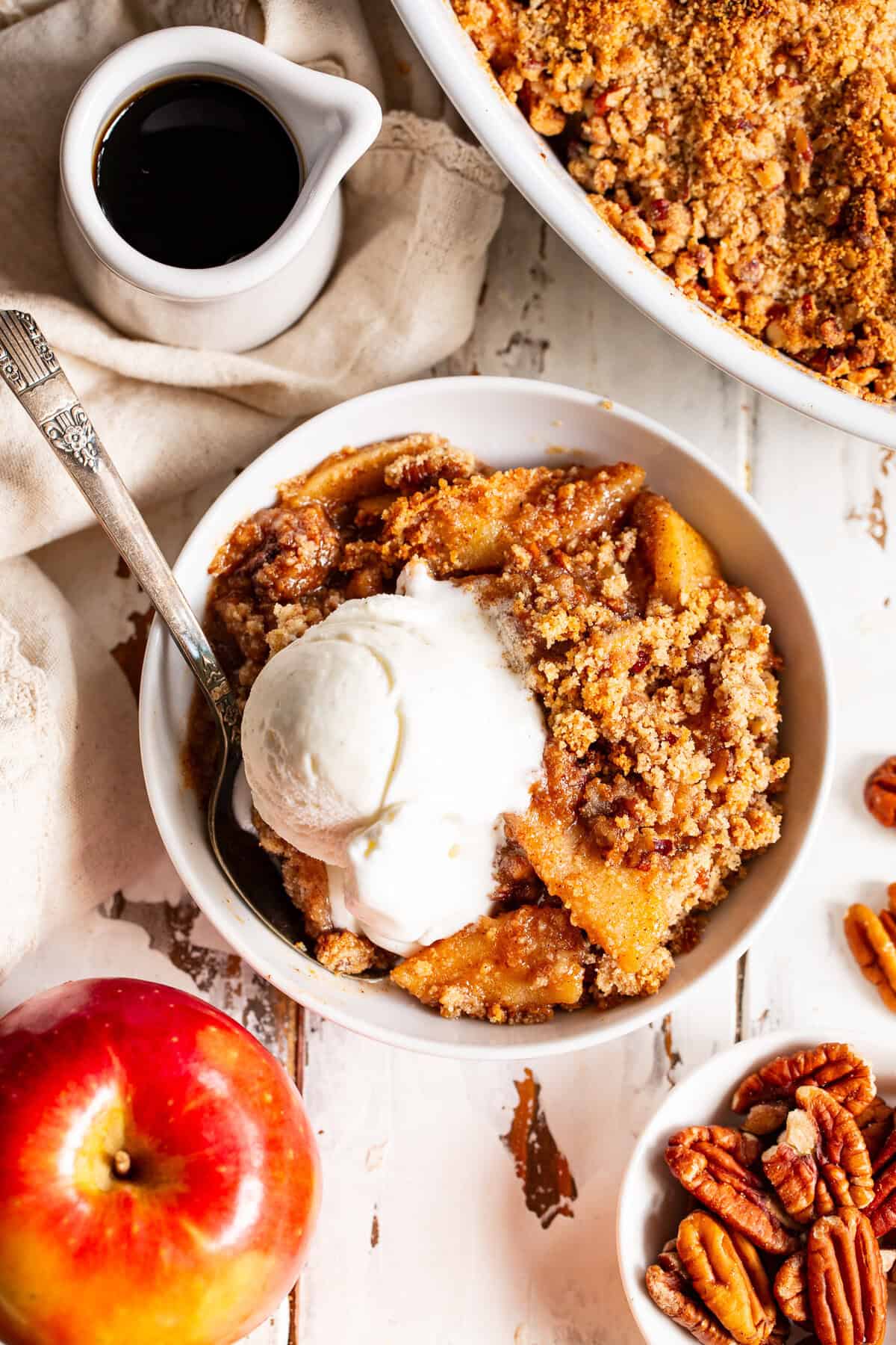 Paleo apple crisp with maple pecan crumble and vanilla ice cream