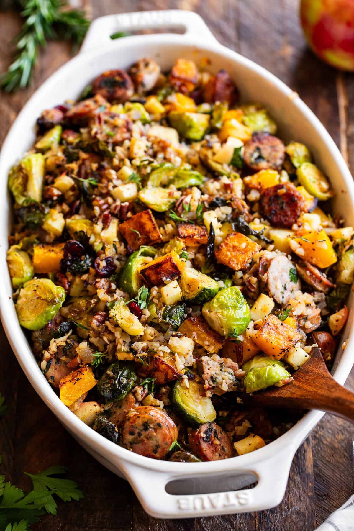 Harvest casserole with chicken sausage, butternut squash, Brussels sprouts, apples and cranberries