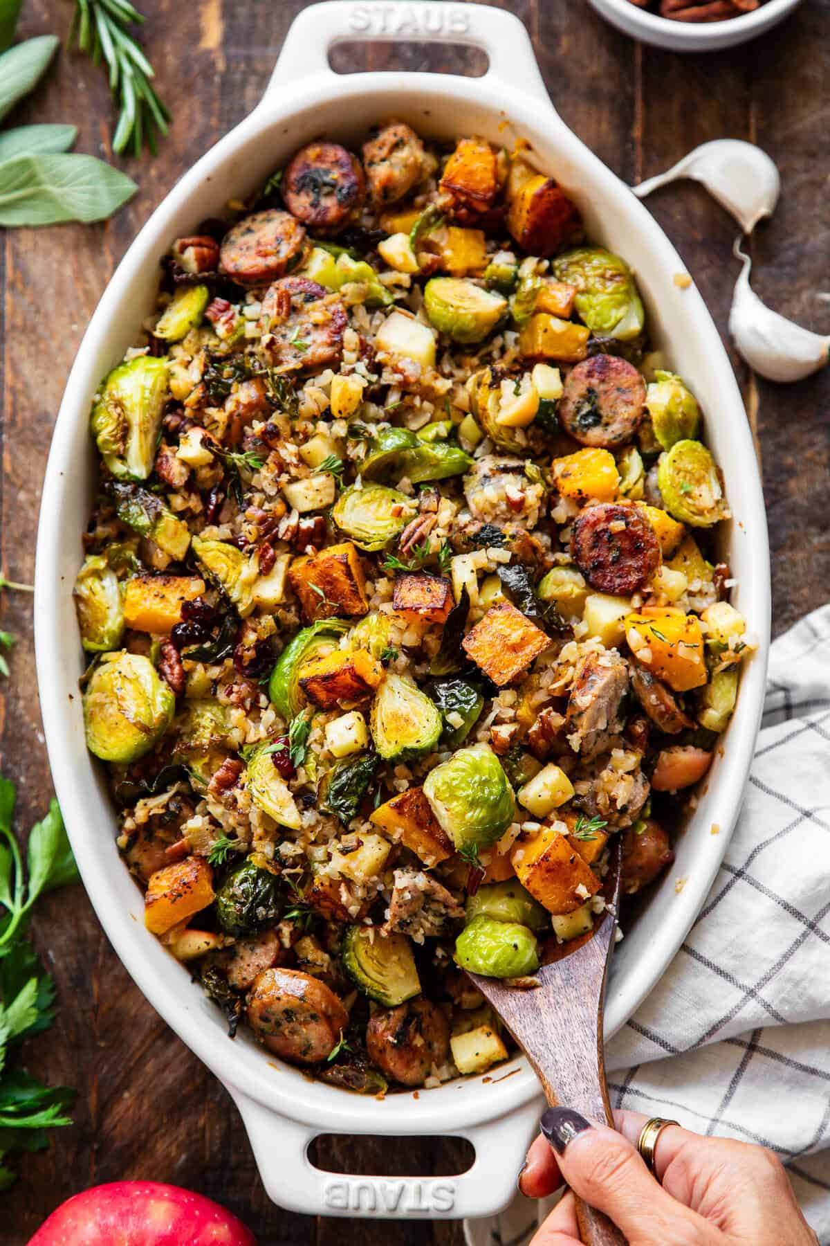 Harvest casserole with chicken sausage, butternut squash, Brussels sprouts, apples and cranberries