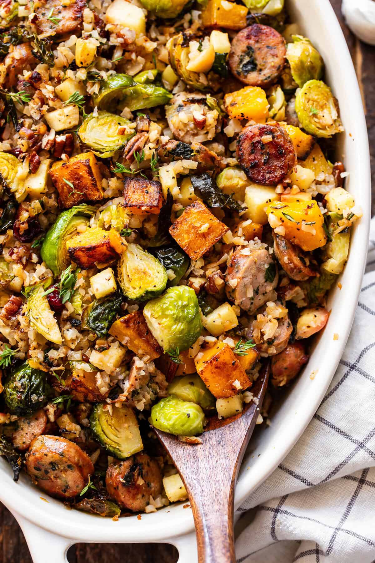Harvest casserole with chicken sausage, butternut squash, Brussels sprouts, apples and cranberries