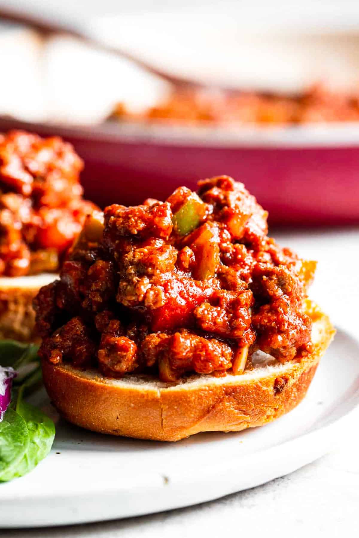 paleo sloppy joes on bun with rich saucy ground beef and peppers