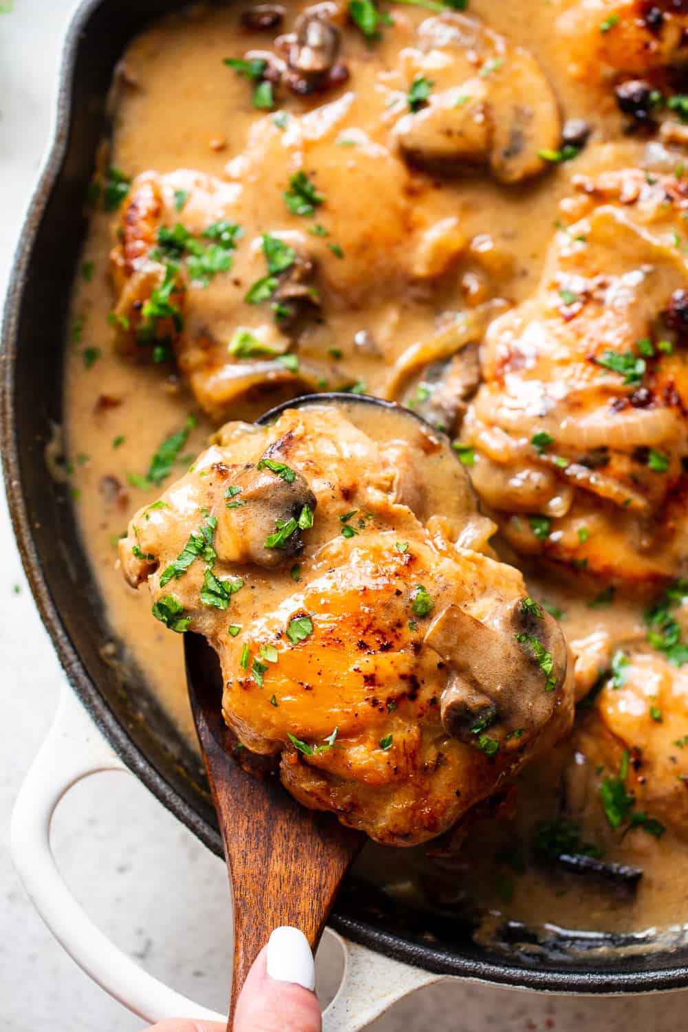 This hearty and savory paleo chicken stroganoff is made all in one skillet for a quick, delicious and cozy weeknight meal.  It’s Whole30, low carb and keto and delicious served over sautéed cauliflower rice, your favorite veggie noodles or roasted veggies. #paleo #whole30 #keto #lowcarb #cleaneating 