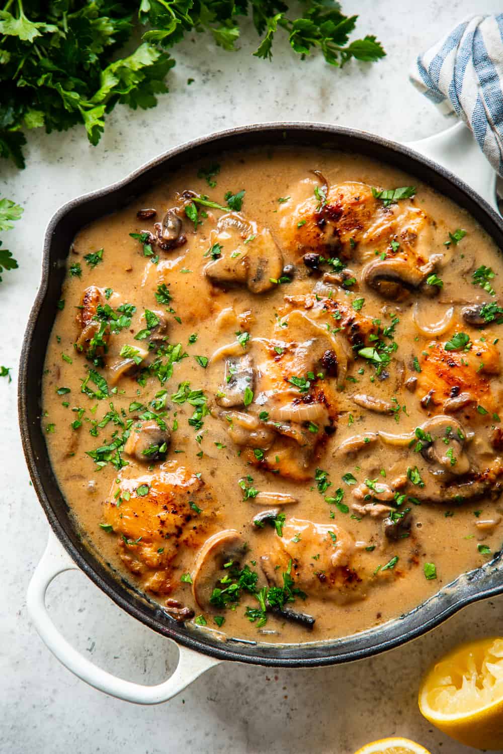 This hearty and savory paleo chicken stroganoff is made all in one skillet for a quick, delicious and cozy weeknight meal.  It’s Whole30, low carb and keto and delicious served over sautéed cauliflower rice, your favorite veggie noodles or roasted veggies. #paleo #whole30 #keto #lowcarb #cleaneating 