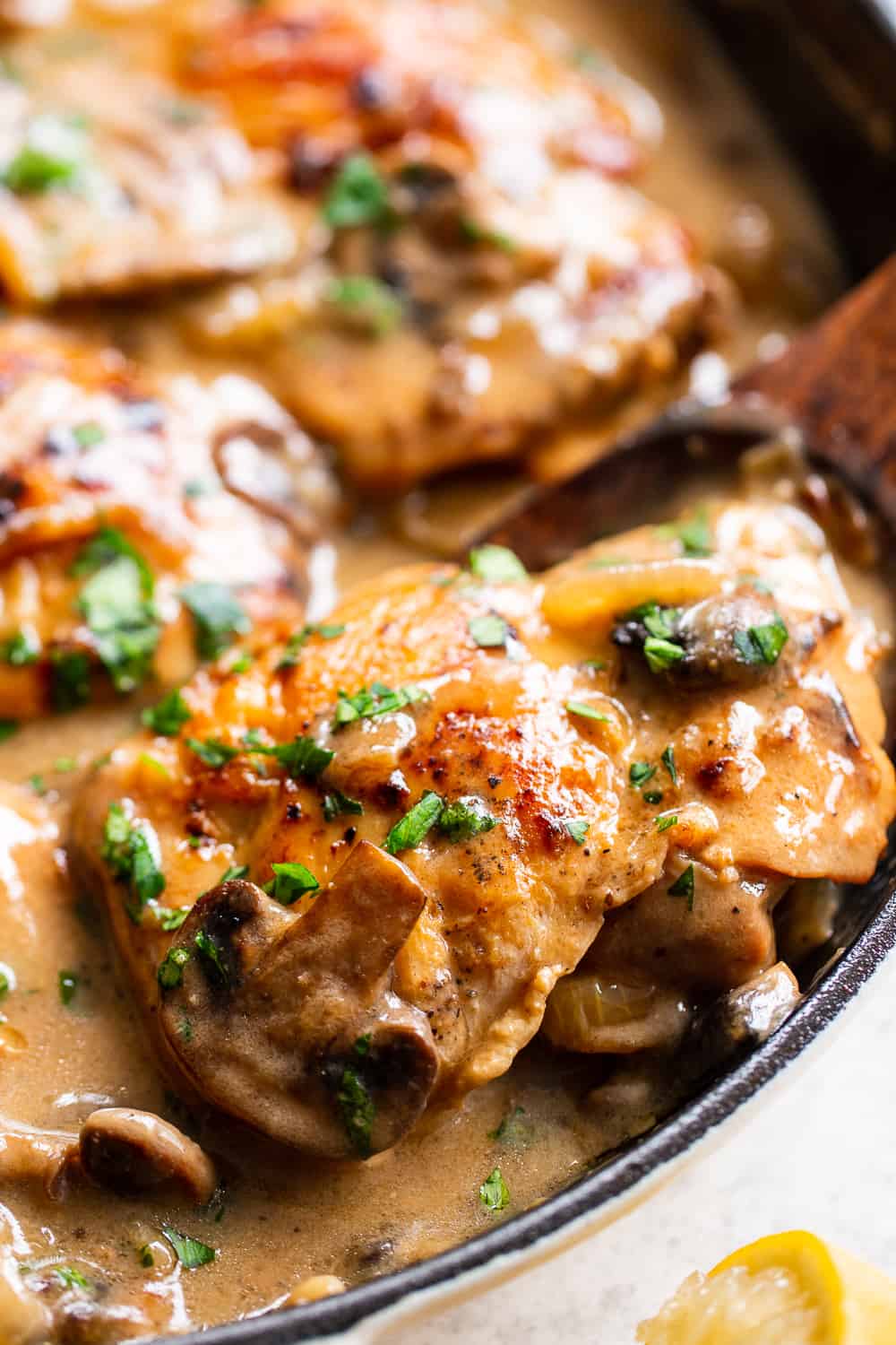 This hearty and savory paleo chicken stroganoff is made all in one skillet for a quick, delicious and cozy weeknight meal.  It’s Whole30, low carb and keto and delicious served over sautéed cauliflower rice, your favorite veggie noodles or roasted veggies. #paleo #whole30 #keto #lowcarb #cleaneating 