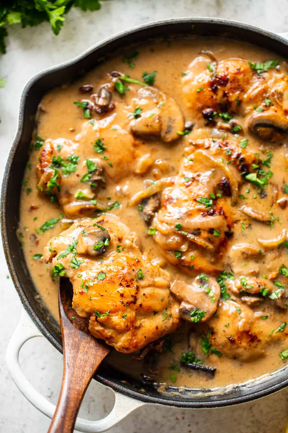 This hearty and savory paleo chicken stroganoff is made all in one skillet for a quick, delicious and cozy weeknight meal.  It’s Whole30, low carb and keto and delicious served over sautéed cauliflower rice, your favorite veggie noodles or roasted veggies. #paleo #whole30 #keto #lowcarb #cleaneating 